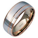 This statement men's wedding band features an accent of 14k rose gold within a 14k white gold background.