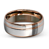 This statement men's wedding band features an accent of 14k rose gold within a 14k white gold background.