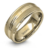 A contemporary ribbed design in lustrous white gold is outlined with two exquisite yellow gold bands in this striking men's wedding band.