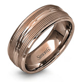 A contemporary ribbed design in lustrous white gold is outlined with two exquisite yellow gold bands in this striking men's wedding band.