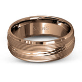 A contemporary ribbed design in lustrous white gold is outlined with two exquisite yellow gold bands in this striking men's wedding band.