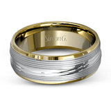 A contemporary ribbed design in lustrous white gold is outlined with two exquisite yellow gold bands in this striking men's wedding band.