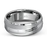 A contemporary ribbed design in lustrous white gold is outlined with two exquisite yellow gold bands in this striking men's wedding band.