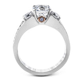 The classic design of this white gold engagement ring is highlighted by .20 ctw of round cut white diamonds and accentuated by .48 ctw of round cut white side diamonds.