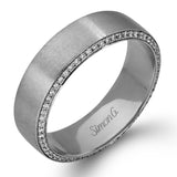 The classic design of this two-tone band features a hint of modernism with a yellow gold interior and white gold exterior accentuated by .50 ctw round cut white diamonds.
