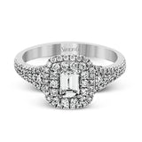 This show-stopping white gold ring features intricately detailed halo and sides containing a total of .61 ctw in round white diamonds.