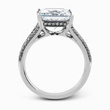 This lovely classic white gold engagement ring is accentuated by .34 ctw of round cut white diamonds in an eye-catching openwork design.