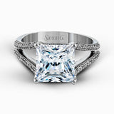 This lovely classic white gold engagement ring is accentuated by .34 ctw of round cut white diamonds in an eye-catching openwork design.