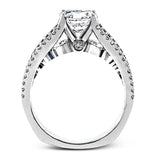 The lovely vintage style of this white gold engagement ring is further enhanced by .91 ctw of shimmering round cut diamonds.