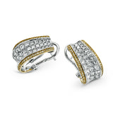 These striking contemporary curved two-tone earrings are set with 2.29 ctw princess cut diamonds complemented by .25 ctw yellow diamonds along the edges.