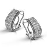 These striking contemporary curved two-tone earrings are set with 2.29 ctw princess cut diamonds complemented by .25 ctw yellow diamonds along the edges.