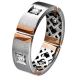Featuring an impressive contemporary design, this white gold band is inset with .32 ctw of round cut white diamond and rose gold accents.
