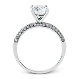 This impressive contemporary white gold engagement ring and wedding band set are emphasized by 1.00 ctw of dazzling round cut white diamonds.