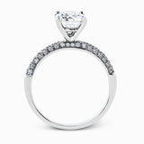 This impressive contemporary white gold engagement ring and wedding band set are emphasized by 1.00 ctw of dazzling round cut white diamonds.