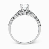 Featuring a charming classic design, this white gold engagement set is accented by .48 ctw of glistening round cut white diamonds.