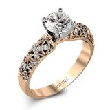 Featuring a delicate floral design, this white gold vintage engagement ring is set with .35 ctw of shimmering white diamonds.