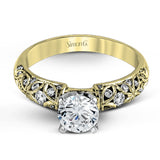 Featuring a delicate floral design, this white gold vintage engagement ring is set with .35 ctw of shimmering white diamonds.
