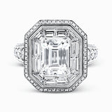 This gorgeous white gold contemporary engagement features an arresting 1.65 ctw of mosaic diamonds accentuated by .80 ctw of princess cut white diamonds.