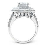 This gorgeous white gold contemporary engagement features an arresting 1.65 ctw of mosaic diamonds accentuated by .80 ctw of princess cut white diamonds.