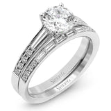 This dazzling white gold wedding set is enhanced by .21 ctw round cut white diamonds with side accents of .53 ctw of baguette cut diamonds.