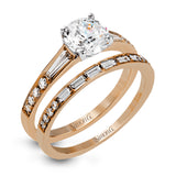 This dazzling white gold wedding set is enhanced by .21 ctw round cut white diamonds with side accents of .53 ctw of baguette cut diamonds.