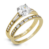 This dazzling white gold wedding set is enhanced by .21 ctw round cut white diamonds with side accents of .53 ctw of baguette cut diamonds.