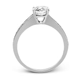 This dazzling white gold wedding set is enhanced by .21 ctw round cut white diamonds with side accents of .53 ctw of baguette cut diamonds.