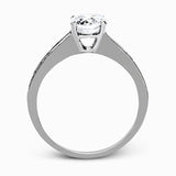 This dazzling white gold wedding set is enhanced by .21 ctw round cut white diamonds with side accents of .53 ctw of baguette cut diamonds.