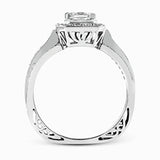 Presenting a vintage-inspired design, this white gold ring is accented by .23 ctw round cut white diamonds and .23 ctw princess cut diamonds.