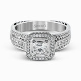 Presenting a vintage-inspired design, this white gold ring is accented by .23 ctw round cut white diamonds and .23 ctw princess cut diamonds.