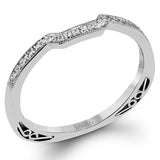 Presenting a vintage-inspired design, this white gold ring is accented by .23 ctw round cut white diamonds and .23 ctw princess cut diamonds.