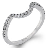 This unique diamond engagement ring features a 3-stone design for a RD center with halo, 2 round sides 0.14 ctw., and white diamonds on a split shank 0.24 ctw.