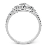 The intricate design of this vintage style white gold ring is enhanced by .64 ctw of glistening round cut white diamonds.