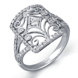 The intricate design of this vintage style white gold ring is enhanced by .64 ctw of glistening round cut white diamonds.