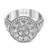 This spectacular ring features a Simon Set center feature with 1.85 ctw of custom-cut diamonds that fit perfectly together. The rest of the ring contains .72 ctw of round diamonds.