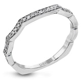 Featuring an elegant twisted contemporary design, this white and rose gold engagement ring complemented by .51 ctw of shimmering round cut white diamonds.