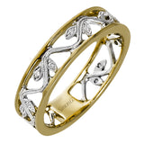 An intricate floral design highlights this classic white and yellow gold ring accentuated by .04 ctw of elegant round cut white diamonds.