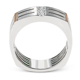 The impressive contemporary style of this men's white gold band is set with .19 ctw of sparkling white diamonds and rose gold accents.