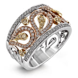 Featuring a gorgeous paisley-inspired design, this white, rose, and yellow gold classic band is set with .41 ctw round cut white diamonds and .23 ctw yellow diamonds.