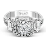 This impressive white gold ring features .43 ctw emerald cut side diamonds and is accented with .38 ctw round cut diamonds.