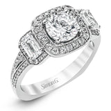 This impressive white gold ring features .43 ctw emerald cut side diamonds and is accented with .38 ctw round cut diamonds.