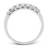 Elegantly simple, this classically styled white gold band is accented by the presence of .50 ctw of shimmering round cut white diamonds.