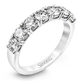 Featuring a dazzling classic design, this platinum band is accentuated by a row of 1.50 ctw sparkling round cut white diamonds.