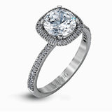 Featuring a contemporary take on a vintage style, this white gold engagement ring and band is complemented by .50 ctw of striking round cut white diamonds.