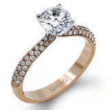 The classic design of this white gold engagement ring and wedding band set is emphasized by .72 ctw round cut white diamonds.