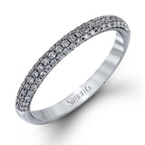 The classic design of this white gold engagement ring and wedding band set is emphasized by .72 ctw round cut white diamonds.