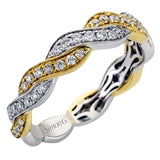 Featuring a dynamic two-tone twist design, this yellow and white gold contemporary ring is set with .53 ctw of round cut white diamonds.