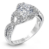 Set with .35 ctw of arresting round cut white diamonds, this lovely white gold engagement ring features a memorable intertwined design on the band.