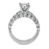 This marvelous white gold wedding set highlights its center stone with 1.19 ctw of round white diamond accents.