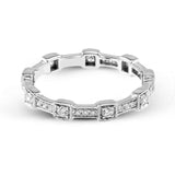 This white gold band form a modern style band set with .33 ctw of striking round cut white diamond accents. Perfect for stacking.